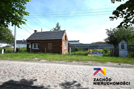 Działka z małym domkiem w Suchej